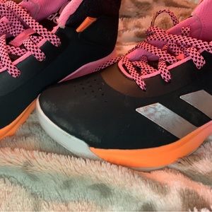 I am selling a size 2 1/2 adidas basketball shoes for girls .